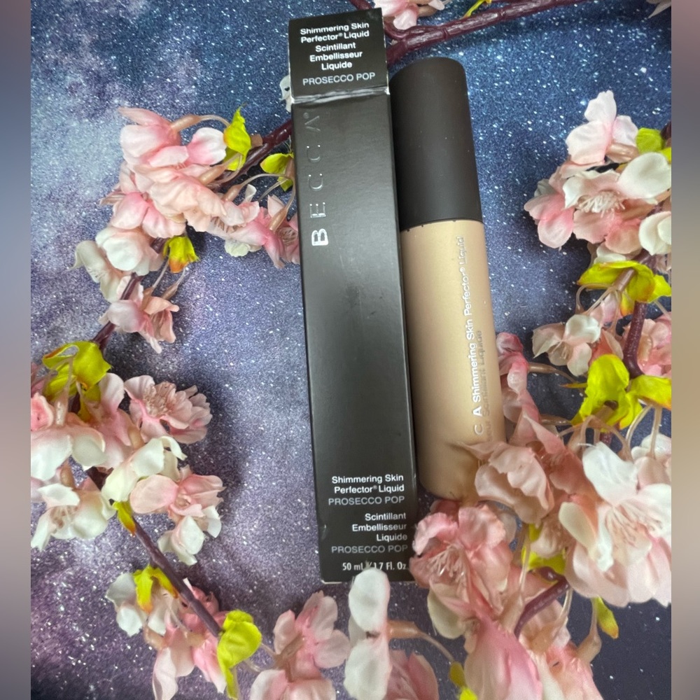 Becca shimmering skin perfector liquid in the color Prosecco pop